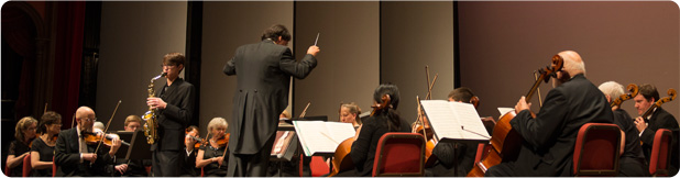 Marcus Sander, winner of the 16-18 age bracket in 2013, plays an alto saxophone solo with the Festival Orchestra. Marcus Sander, winner of the 16-18 age bracket in 2013, plays an alto saxophone solo with the Festival Orchestra.